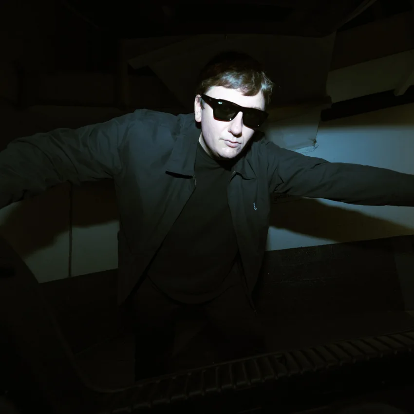 EARGASM GOD promotional portrait wearing sunglasses