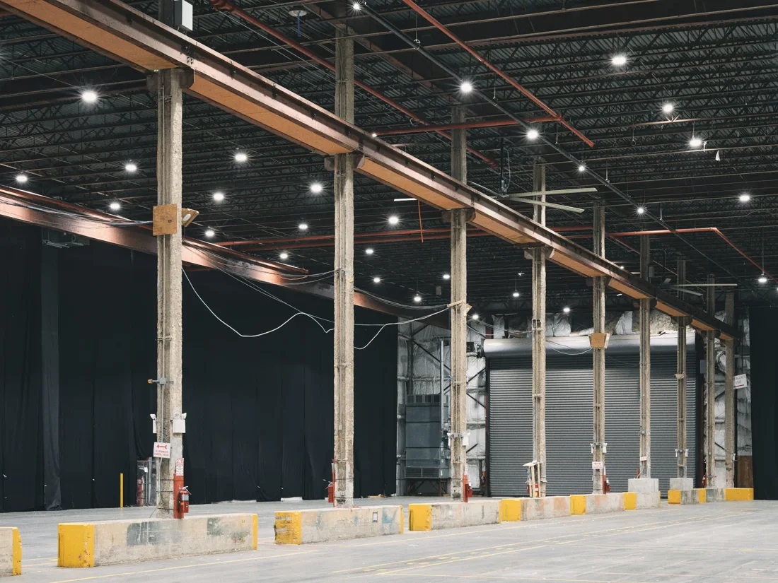 Brooklyn Storehouse empty warehouse hall with steel columns and black drapes