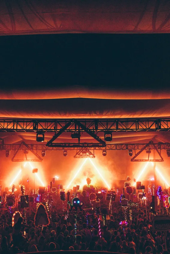 Crowd facing a lit stage at Lost Paradise in Glenworth Valley