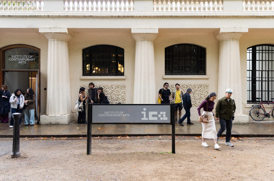 ICA columned entrance on Carlton House Terrace with signboard and visitors