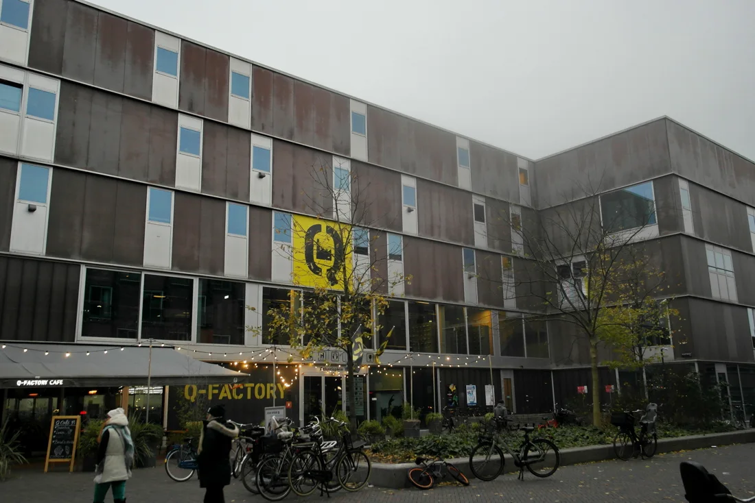 Q-Factory building on Atlantisplein with Q-Factory signage and cafe