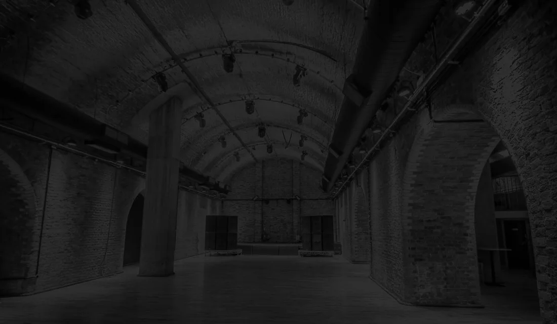 The Steel Yard empty brick-arched hall with speaker stacks